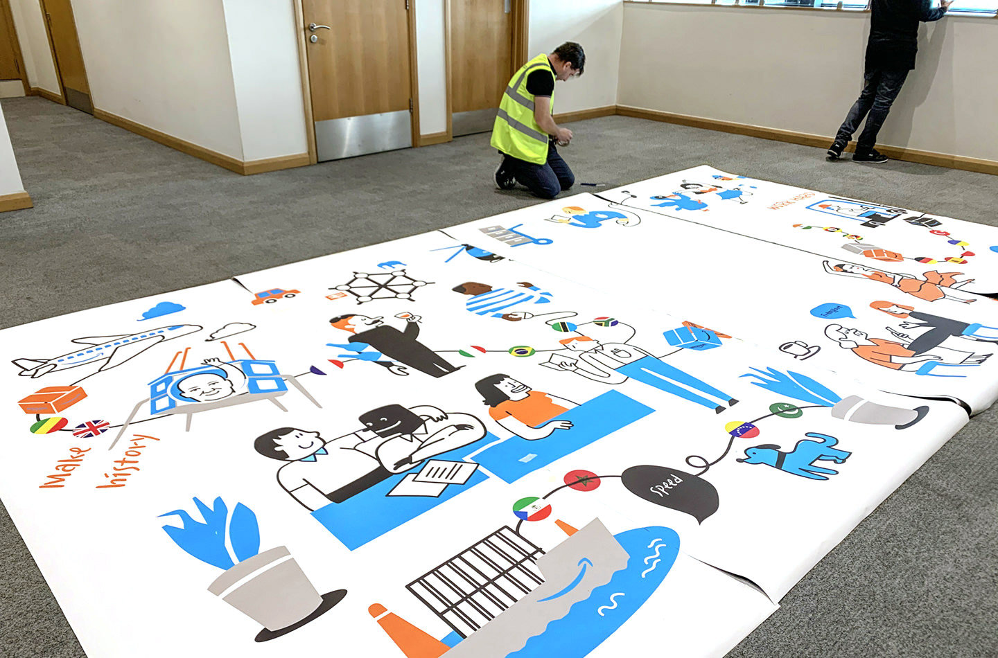 Signage - Amazon ROC Wallpaper Install